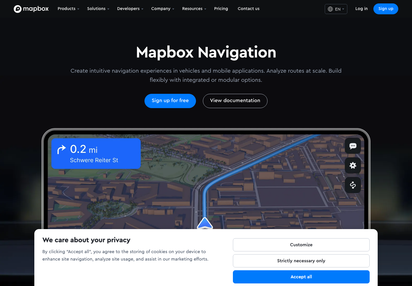 Mapbox Navigation product page showing a turn-by-turn driving instruction overlaid on a 3D map view